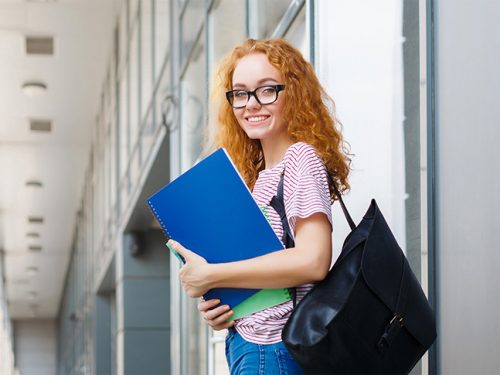 Young Student Girl On The Way to Classes